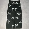 Mäns jeans geometriska mönster tryck hip-hop estetiska goth mode y2k lös bred ben svart jogging tröjor lat stil avslappnad