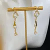 Des boucles d'oreilles de perles délicates pour les femmes incrustées de boucles d'oreilles longues en diamant en cristal en boucles d'oreilles en boucles d'oreilles de lette