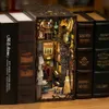 CUTEBEE Book Nook Kit DIY Maison de poupée en bois avec meubles lumineux tactiles Serre-livres de pharmacien magique Décorations de Noël miniatures 231212