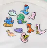 Cartoon Dinosaur Family Brooch Pins 12st Set Sweet Animal Alloy Emamel Paint Men039s Suit Brooches Små smycken Present Badge Shi8032579