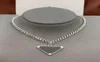 Pendant Necklaces Womens Mens Luxury Designer Necklace Chain Fashion Jewelry Black White P Triangle Pendant Design Party Silver Hi7640156