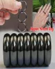 Anillos de hematita Banda magnética de piedra negra para hombres Mujeres0127708582