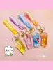 Keychains Fashion Quicksand Ocean Series Milk Tea Cup Keychain Liquid Floating Peal Car Bag Pendant Key Ring Smycken för kvinnor GIR9120245