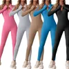 Yoga -outfit Zipper Vneck Sports Jumpsuit met lange mouwen Skinny Stretch Ribbed Fitness Romper Women Street Playsuit Club overalls 231212