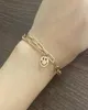 Le lettre de visage creux de perle pendante femme039 Bracelet Hiphop Temphop Étudiant Accessoires Hands Gold Chains Bracele5581300