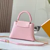 7A Capucines Spect Bags Borse Designer Borse da donna Borse da donna Genuina in metallo glassato intagliato manico intagliato rosa