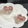 Projektowanie słuchawki Stud Stud Kobiety Urocze kolczyki Sier Sier ze stali nierdzewnej Wysokiej jakości CZ Diamond Crystal Pink Heart Carring Wedding Jewelry Prezent Świąteczny