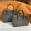 Designer di lusso Tote Bags Hremmmss Party Garden Online Store Fili in cera fatta a mano Trovate in pelle Negona 30 36 cm di grande capacità ha un logo reale