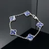 Nouveau Peter Stone Four Leaf Grass Clover Collier de fleur Collier bleu couleur