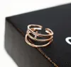 Koreańska wersja Trend punk threelayer Cyrron splatany 18 -karowy złoty pierścień żeński prosta i wykwintna kobieca biżuteria z dzikiego pierścienia 2362370