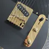 Chitarra elettrica nera opaca personalizzata con rilegatura gialla ponte tremolo Floyd Rose Tastiera gialla vintage con intarsio a punti battipenna nero