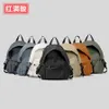 Fashionabla och lätta nylonryggsäck för kvinnor, enkla och mångsidiga för utomhusresor, japanska och koreanska nya studentens ryggsäck