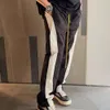 RHUDE PANTSデザイナーファッションメン小さくてトレンディな色コントラストパッチワークハイストリートカジュアルドローストリングスポーツストレートパンツ