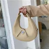 الأكياس المسائية الشعبية النسخة الكورية الكورية الملمس الأزياء lychee crescent البسيطة الإبطين الكتف Bag253L