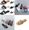 Projektowne slajdy kobiety haftowane tkaniny kapcie metalowe sandały luksusowe P Trójkąt sandałowy diament olśniewa