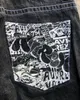 Kvinnor Jeans American Classic Retro Comic Pocket Print Mens Black Harajuku High Street Low Midje Loose Floormopping Pants 231212