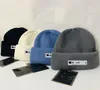 Beanie designer gorros de inverno chapéu de malha para homens e mulheres moda crânio bonés letras chapéus de rua sorrindo rosto boné cores disponíveis8366539