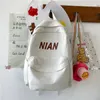 Bolsas escolares de color sólido japonés mochila minimalista mochila escolar mujeres versátiles impermeables para hombres