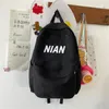Bolsas escolares de color sólido japonés mochila minimalista mochila escolar mujeres versátiles impermeables para hombres