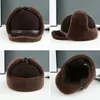 Trapper chapéus de lã de pele real chapéu unisex inverno quente bombardeiro russo ushanka com abas de orelha de couro de vaca grossa neve earflaps boné de beisebol 231213