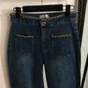 Łańcuchowe dżinsy na nogach Women Designer haft haftowe dżinsowe spodnie dżinsowe Spodnie dżinsowe