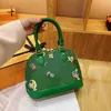 2024 Hoge kwaliteit Alma damesbloem schoudertas ketting crossbody tas lederen handtas shell portemonnee dames cosmetica crossbody tas handtas