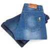 Jeans masculinos estilo clássico homens verão fino negócio casual estiramento magro denim calças luz azul preto calças masculinas