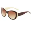 Summer Beach Mujeres Gafas de sol Letra C dorada en lentes Gafas de diseño Sombra de moda redonda Marcos de gafas de sol ojo de gato marrón s289i