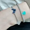 Material de oro 2024 V Pulsera de cinco flores de calidad lujosa con tono y diamante brillante para joyería de compromiso para mujer con caja de sello PS2105