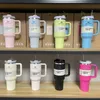 Wholesale 40oz insulated cup with straw stainless steel handle ice cream cup car mounted car cup