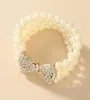 Nouveau baroque multicouche imitation perle bracelet en métal or arc strass charme bracelets pour femme bijoux de fête accessoires14814327