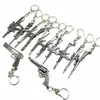 HELA 50PCSLOT GAME GUN MODEL KEY KEDA Kedjan Metalllegering Nyckelringar Keys Holder Storlek 6cm Blisterkortpaket Key Chains8253638