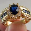 Anneaux de mariage luxueux bleu rouge Zircon mode hommes et femmes couleur or anniversaire unisexe bijoux en gros 231213