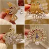 Brooches Winter Retro Peacock Phoenix Copper Pins Luxury Full Zircon Gold-plated Animal Pearl Accessories Women Gifts