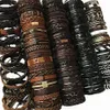 全体のロットバルクランダム50pcs 30pcsロットパンクメンズレザーブレスレットFemme Pulseras BileklikカップルブレスレットメンジュエリーW209F