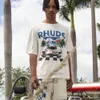 T-shirt Rhude Designers Moda Uomo Donna Branded F1 Miami High Street Brand Ins T-shirt manica corta allentata estiva con etichetta e logo