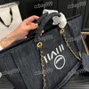 Büyük kapasiteli denim kadınlar tote çanta baskılı mektup taşınabilir crossbod omuz çantası lüks el çantası kapitone trend pochette lacivert bavul sacoche 37x29cm