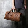 Duffel Påsar Retro Male Carry-on Bag Europe och America Crazy Horse Leather Travel Bag Layer Cowhide stor kapacitet Enkel axelväska 231214