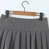 Skirts YENKYE Y2K Pinstripe Pleated Mini Skirt Women Sexy Low Waist Short Skater Jupe