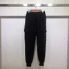 Pantaloni di protezione con coulisse in spugna con doppia tasca con etichetta laterale di marca di nuova moda primavera e autunno per pantaloni casual larghi in tinta unita da uomo e da donna