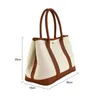 Top Original Großhandel Hremmss Party Garden Tasche Taschen Online Shop PU Splicing Leinwand Tasche Schulter Frauen tragbare Gartengenerierung mit echtem Logo