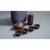 Tazze da tè Set da tè da viaggio cinese con sabbia viola Una pentola Quattro tazze portatili Kung Fu e 231214