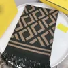 A Fashionable Scarf With A Luxurious Blend Of Cashmere And Gold Silk, Featuring Striped Border Patterns That Are Warm And Versatile