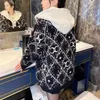 Kurtki damskie stacja europejska luźne swetry moda spółek oddzielenia fałszywy dwuczęściowy dzianin gęstwy kardigan 231214