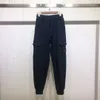 Pantaloni di protezione con coulisse in spugna con doppia tasca con etichetta laterale di marca di nuova moda primavera e autunno per pantaloni casual larghi in tinta unita da uomo e da donna