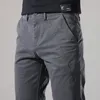 Pantalons masculins Hommes décontractés slim stretch stretch printemps et automne d'arrivée de mode de mode desinger streetwear pantalon masculin 231213