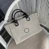 Bolso de diseñador clásico Bolso de playa de verano Carta de mujer Hombro Flash Oficina Alta calidad de lona con botón Bolsas de lujo retro