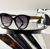 Solglasögon för kvinnor designer runda solglasögon toppkvalitet original män berömda klassiska retro lyxiga glasögon mode kvinnor solglasögon uv400 5414 med låda