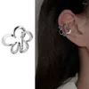 Boucles d'oreilles à dos pour femmes, Clip d'oreille creux en forme de fleur, matériau en alliage, bijoux de fête, cadeau