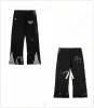 Pantalones de diseñador para hombre Joggers tipo cargo Pantalón deportivo Cargos Pantalones deportivos con estampado de graffiti Pantalon Splash Ink Jogger Suelto